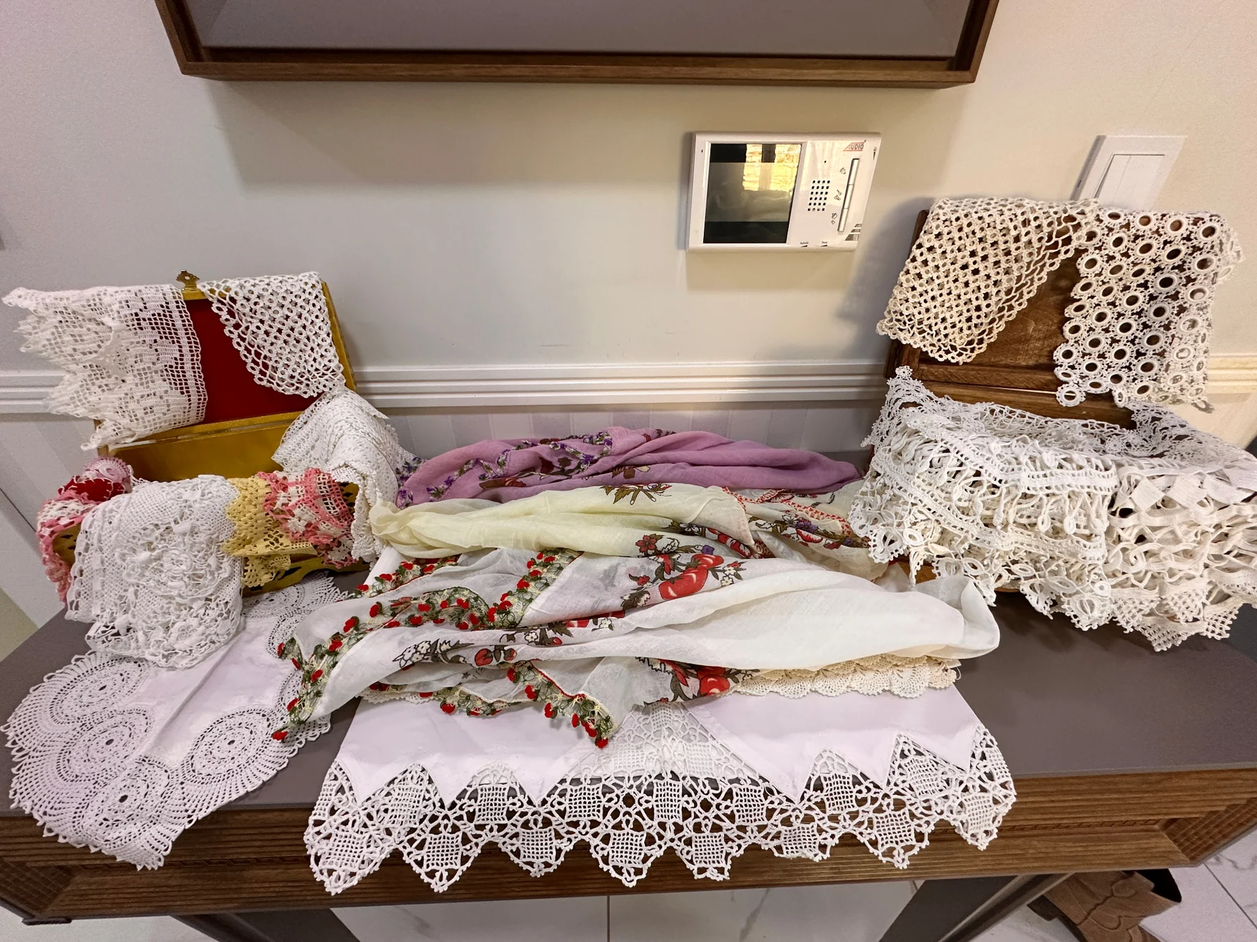 Old lace, doilies and oya-trimmed scarves kept from Ayten's early years